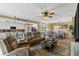 Spacious living room with open floor plan and access to the kitchen at 6065 Worsham Ln # 104, Bradenton, FL 34211