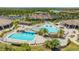 Resort-style pool with a large deck and plenty of lounge chairs at 6065 Worsham Ln # 104, Bradenton, FL 34211