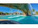 Relaxing resort-style pool with a waterfall feature at 6065 Worsham Ln # 104, Bradenton, FL 34211