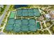 Aerial view of community tennis courts at 6065 Worsham Ln # 104, Bradenton, FL 34211