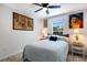 Bright bedroom with a comfortable bed and unique wall art at 6250 Holmes Blvd # 71, Holmes Beach, FL 34217