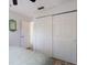 Bedroom with large closet and tiled floor at 6250 Holmes Blvd # 71, Holmes Beach, FL 34217