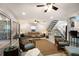 Spacious living room with a neutral color palette and access to a private balcony at 6250 Holmes Blvd # 71, Holmes Beach, FL 34217