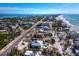 Expansive aerial view showing a community near the ocean and nearby beaches at 6473 Gulf Of Mexico Dr, Longboat Key, FL 34228