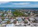 Aerial shot highlights a lovely home with a pool, nestled in a charming coastal neighborhood at 6473 Gulf Of Mexico Dr, Longboat Key, FL 34228