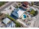 Stunning aerial view of a modern home featuring a private pool and well-maintained landscaping at 6473 Gulf Of Mexico Dr, Longboat Key, FL 34228