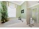 Bright bathroom featuring a soaking tub, a separate shower, and decorative wallpaper at 6473 Gulf Of Mexico Dr, Longboat Key, FL 34228
