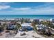 Stunning beachfront home with panoramic ocean views and lush tropical landscaping at 6473 Gulf Of Mexico Dr, Longboat Key, FL 34228