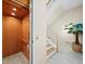 An elevator and a staircase leading to the second floor showing accessibility at 6473 Gulf Of Mexico Dr, Longboat Key, FL 34228