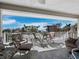 Relax on the spacious lanai with comfortable seating and views of the beach at 6473 Gulf Of Mexico Dr, Longboat Key, FL 34228