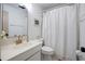 Clean bathroom with updated vanity and shower at 6884 W Country Club Ln, Sarasota, FL 34243