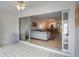 Bright sunroom with sliding glass doors offering views of backyard at 6884 W Country Club Ln, Sarasota, FL 34243