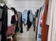 Spacious walk-in closet with ample shelving and hanging space at 6884 W Country Club Ln, Sarasota, FL 34243