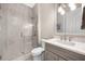 Modern bathroom with a walk-in shower and updated vanity at 7019 Vilamoura Pl, Lakewood Ranch, FL 34202