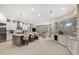 Large kitchen with a center island, granite countertops, and stainless steel appliances at 7019 Vilamoura Pl, Lakewood Ranch, FL 34202