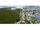 Aerial perspective highlighting the community's waterfront setting and pool at 8644 54Th W Ave # 8644, Bradenton, FL 34210