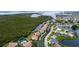 Aerial view showcasing the community, pool, and waterfront location at 8644 54Th W Ave # 8644, Bradenton, FL 34210