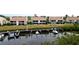 Condo building's backyard and boat docks on the water at 8644 54Th W Ave # 8644, Bradenton, FL 34210