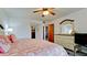 Bright bedroom featuring a comfortable queen-size bed and ample dresser space at 8644 54Th W Ave # 8644, Bradenton, FL 34210