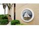 Condo building detail showcasing unique nautical window feature at 8644 54Th W Ave # 8644, Bradenton, FL 34210