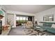Living room with access to a relaxing screened porch at 8644 54Th W Ave # 8644, Bradenton, FL 34210