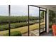 Relaxing screened patio overlooking a peaceful waterway and boat docks at 8644 54Th W Ave # 8644, Bradenton, FL 34210