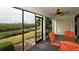 Screened patio with table and chairs, offering waterfront views at 8644 54Th W Ave # 8644, Bradenton, FL 34210