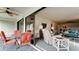 Screened porch with outdoor seating and view of the backyard at 8644 54Th W Ave # 8644, Bradenton, FL 34210