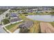 Residential area with houses surrounding a serene pond at 10605 58Th E St, Parrish, FL 34219