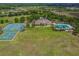 Aerial view of community amenities, including pool and tennis courts at 10605 58Th E St, Parrish, FL 34219