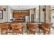 Community bar with leather stools and granite counter at 10605 58Th E St, Parrish, FL 34219