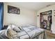 Bright bedroom with a full-size bed and built-in closet at 10605 58Th E St, Parrish, FL 34219