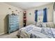 Spacious bedroom with a queen-size bed and ample closet space at 10605 58Th E St, Parrish, FL 34219