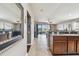 Hallway view of kitchen, living room and access to bedrooms at 10605 58Th E St, Parrish, FL 34219
