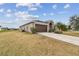 Single-story house with a brown garage door at 10605 58Th E St, Parrish, FL 34219