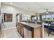 Kitchen island with sink and stainless steel dishwasher at 10605 58Th E St, Parrish, FL 34219