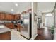 Modern kitchen with stainless steel appliances and an island with seating at 10605 58Th E St, Parrish, FL 34219