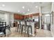 Eat-in kitchen with stainless steel appliances and an island with seating at 10605 58Th E St, Parrish, FL 34219