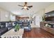 Spacious living room with sectional sofa and hardwood floors at 10605 58Th E St, Parrish, FL 34219