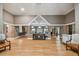 Spacious community clubhouse lobby with hardwood floors at 10605 58Th E St, Parrish, FL 34219