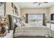 Bright and spacious bedroom with a comfortable king-size bed and window view at 10605 58Th E St, Parrish, FL 34219