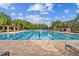 Resort-style pool with ample deck space and lounge chairs at 10605 58Th E St, Parrish, FL 34219