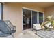 Relaxing screened patio with comfy seating and grill at 10605 58Th E St, Parrish, FL 34219