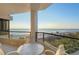 Balcony showcasing a stunning ocean view with seating for relaxation at 1211 Gulf Of Mexico Dr # 211, Longboat Key, FL 34228