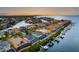 Waterfront homes situated along a canal with boats and lush greenery at 1215 Acappella Ln, Apollo Beach, FL 33572