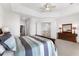 Spacious bedroom with carpeted floors and ensuite bathroom access at 1215 Acappella Ln, Apollo Beach, FL 33572