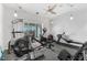 Home gym equipped with various exercise machines at 1215 Acappella Ln, Apollo Beach, FL 33572