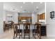 Modern kitchen with island, breakfast nook, and ample cabinet space at 1215 Acappella Ln, Apollo Beach, FL 33572