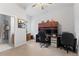 Home office with two desks and built-in shelving at 1215 Acappella Ln, Apollo Beach, FL 33572