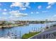 Panoramic waterfront view of canal, boats, and homes at 1215 Acappella Ln, Apollo Beach, FL 33572